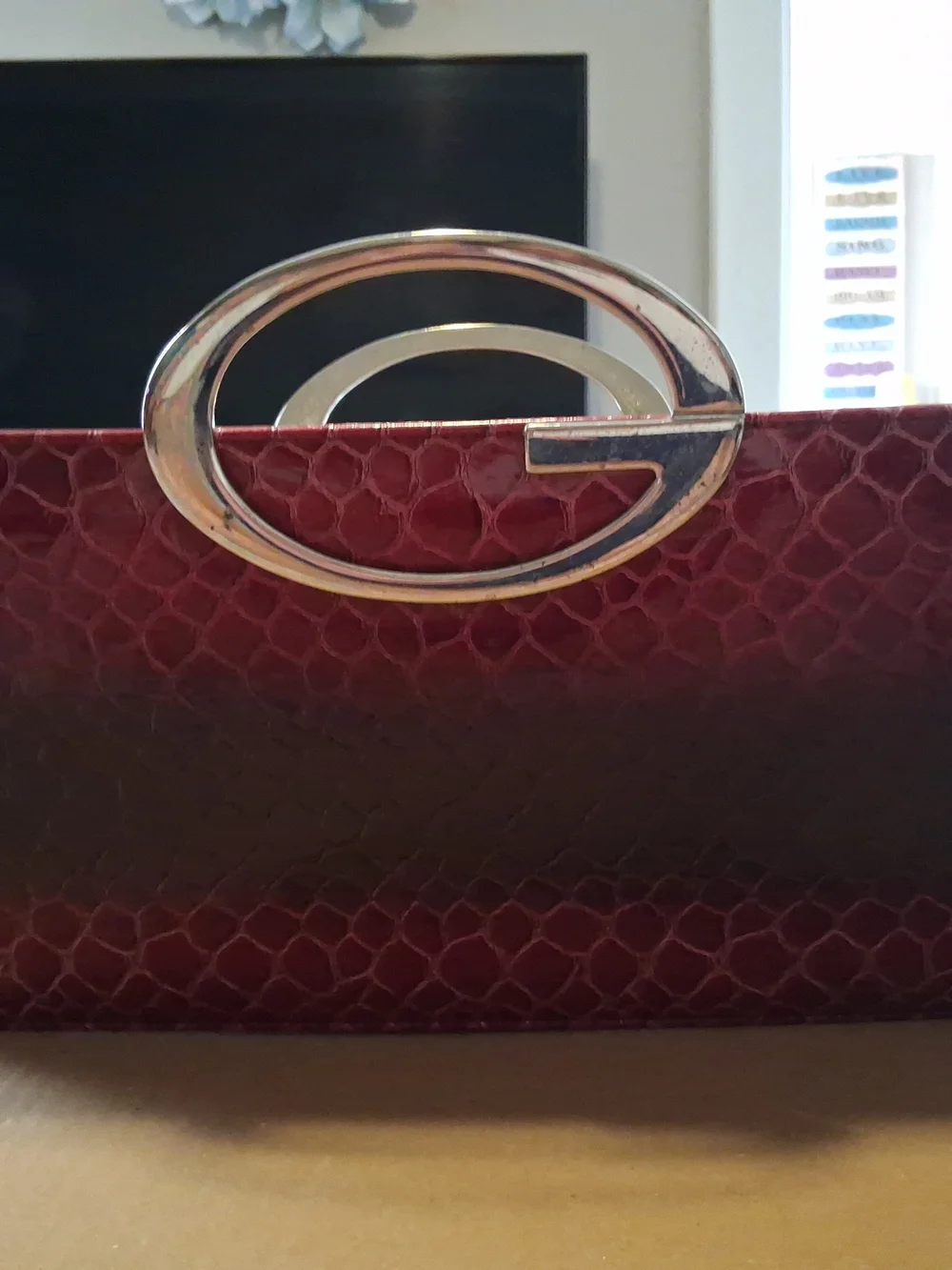 Burgundy Textured Clutch with Gold-Tone G Logo